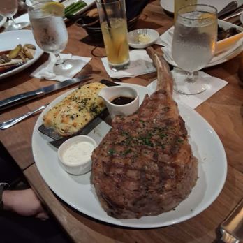 THE RANCH Restaurant - 58oz Cowboy Ribeye with Scallop potatoes. - New American Near Me - Anaheim, California THE RANCH Restaurant - 58oz Cowboy Ribeye with Scallop potatoes. - New American Near Me - Anaheim, California