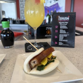 Sekushi - Pork Belly Bao Bun, White Sangria - Sushi Bars Near Me - Belleair Bluffs, Florida Sekushi - Pork Belly Bao Bun, White Sangria - Sushi Bars Near Me - Belleair Bluffs, Florida