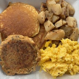 Salmon Cake, eggs, potatoes, a Corn Cake, and a pancake Salmon Cake, eggs, potatoes, a Corn Cake, and a pancake