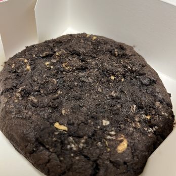 Crumbl - Vienna - Inside the box is a peanut butter cookies and cream cookie - Bakeries Near Me - Vienna, Virginia Crumbl - Vienna - Inside the box is a peanut butter cookies and cream cookie - Bakeries Near Me - Vienna, Virginia