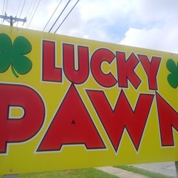 Lucky Pawn - Dig the new sign!