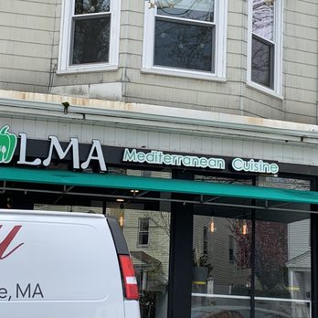 Dolma Mediterranean Cuisine - a van parked in front of a restaurant - Mediterranean Near Me - Brookline, Massachusetts Dolma Mediterranean Cuisine - a van parked in front of a restaurant - Mediterranean Near Me - Brookline, Massachusetts