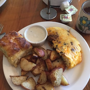 Garden Cafe - Chorizo omelette with red potatoes and a biscuit with gravy. - Breakfast & Brunch Near Me - Dallas, Texas Garden Cafe - Chorizo omelette with red potatoes and a biscuit with gravy. - Breakfast & Brunch Near Me - Dallas, Texas