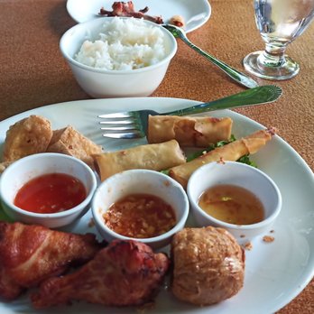 SriPraPhai Thai Restaurant - Fried combination appetizer w/side of Jasmine rice  1/2 way through. Excellent as always. - Thai Near Me - Woodside, New York