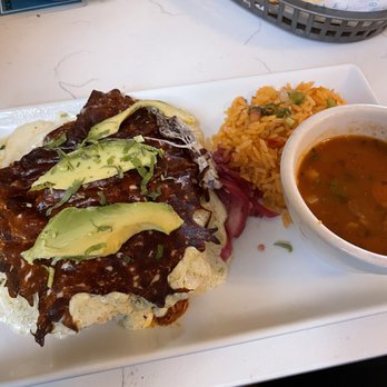 Gabriela's Downtown - Avocado Cream Enchiladas, beans and rice. A++ for the burnt cheese layer - Mexican Near Me - Austin, Texas Gabriela's Downtown - Avocado Cream Enchiladas, beans and rice. A++ for the burnt cheese layer - Mexican Near Me - Austin, Texas