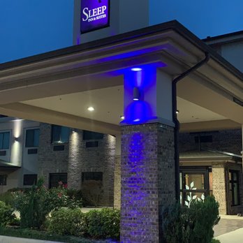 Sleep Inn & Suites - Entrance - Hotels Near Me - Center, Texas