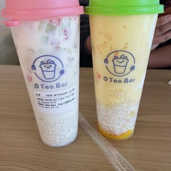 O Tea Bar - Pink lid: Mixed fresh fruit with Sago and Coconut milk. Green lid: Mango Sago. Both DELICIOUS! Not too sweet. - Bubble Tea Near Me - Las Vegas, Nevada O Tea Bar - Pink lid: Mixed fresh fruit with Sago and Coconut milk. Green lid: Mango Sago. Both DELICIOUS! Not too sweet. - Bubble Tea Near Me - Las Vegas, Nevada