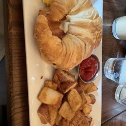 Egg Sandwich* with home fries Egg Sandwich* with home fries