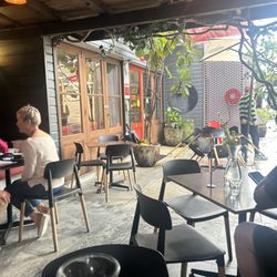 Rock & Roll Coffee Company - A seat at a table looking out towards the entry
