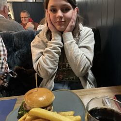 Amberwood Inn - Chicken burger and chips.   with happy child.  Also comes with Cole slaw.  But she took it off the plate.