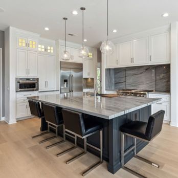 Haynes Cabinet Design - A Kitchen in Rancho Santa Fe features a hidden spice rack behind soft opening/closing Quartzite sliding backsplash, in this Classic Kitchen. - Cabinetry Near Me - Costa Mesa, California Haynes Cabinet Design - A Kitchen in Rancho Santa Fe features a hidden spice rack behind soft opening/closing Quartzite sliding backsplash, in this Classic Kitchen. - Cabinetry Near Me - Costa Mesa, California