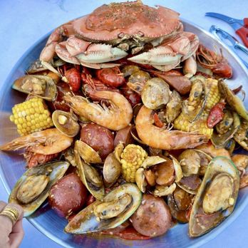 Crab City - Combo C $80 , w/ added Whole Dungenese Crab , it has Mussels, Corn, potatoes , sausage, manila clams, crawfish, shrimp. - Cajun/Creole Near Me - San Diego, California Crab City - Combo C $80 , w/ added Whole Dungenese Crab , it has Mussels, Corn, potatoes , sausage, manila clams, crawfish, shrimp. - Cajun/Creole Near Me - San Diego, California
