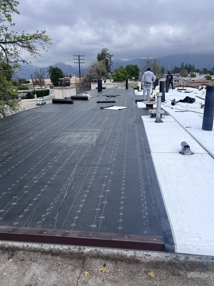 Slide of Husky Roofing