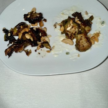 Eddie V's Prime Seafood - Left burnt Brussel sprouts, right how they are supposed to be - Steakhouses Near Me - Houston, Texas Eddie V's Prime Seafood - Left burnt Brussel sprouts, right how they are supposed to be - Steakhouses Near Me - Houston, Texas