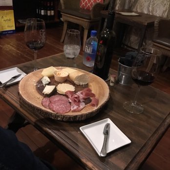 Carrera Wine Cellar - Justin Cab with the meat & cheese board - Wine Bars Near Me - Saint Augustine, Florida