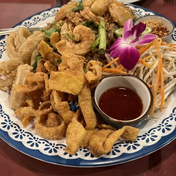 Siam Square - a plate of fried food with dipping sauce - Thai Near Me - Ann Arbor, Michigan