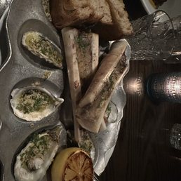 Roasted oysters and bone marrow dish Roasted oysters and bone marrow dish