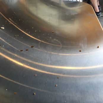 Which Wich - a man sitting at a table with a skateboard - Sandwiches Near Me - Marietta, Georgia Which Wich - a man sitting at a table with a skateboard - Sandwiches Near Me - Marietta, Georgia