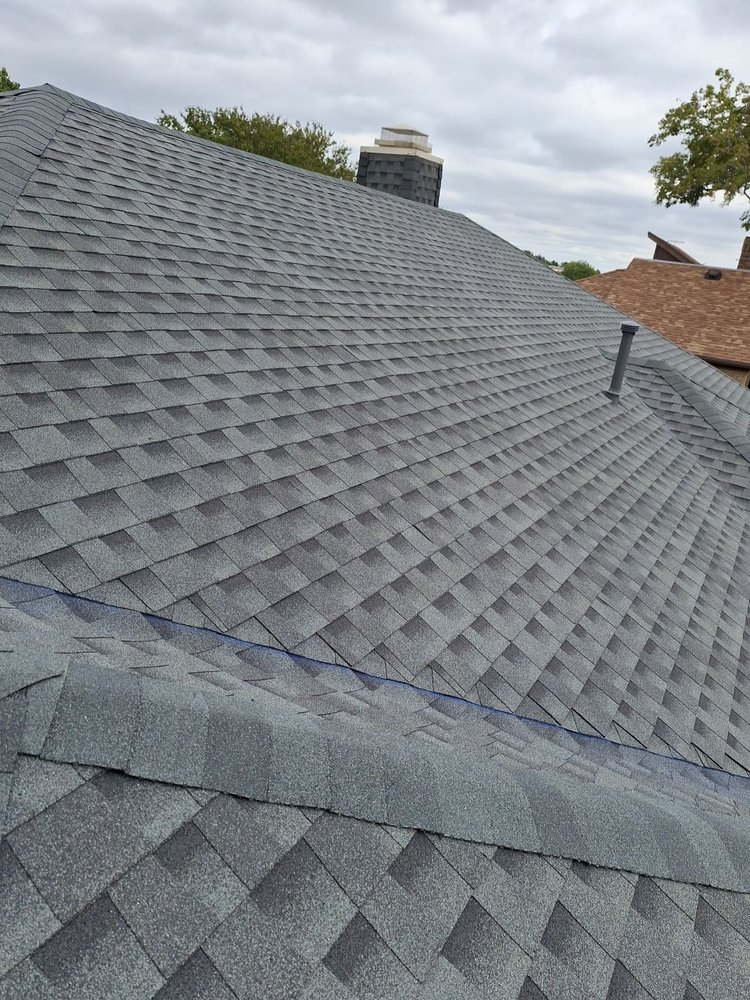 Slide of Bert Roofing