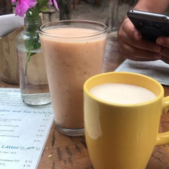 Raw Love - Organic coffee with coconut milk and tropical kiss smoothie - Vegan Near Me - Tulum, ROO Raw Love - Organic coffee with coconut milk and tropical kiss smoothie - Vegan Near Me - Tulum, ROO