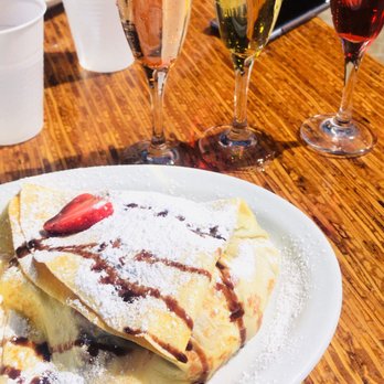 Crêpe Expectations - Strawberry and banana nutella crepe with some mimosas at Crepe Expectations! - Creperies Near Me - Las Vegas, Nevada