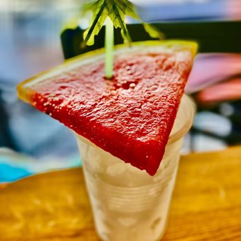Twisted Tiki - LOVE LOVE LOVE the "waikiki punch"  watermelon Rum punch with the cold slice of watermelon on top. So refreshing! Arrrrr! - Tiki Bars Near Me - St. Petersburg, Florida