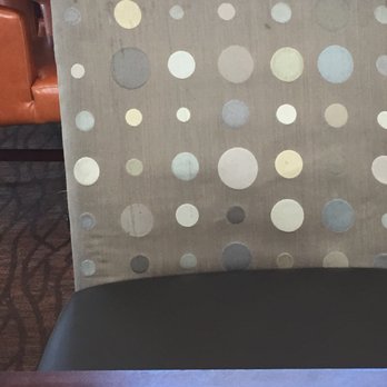 Hilton Garden Inn Columbus - Seats in the dining room are dated, dirty and worn. - Hotels Near Me - Columbus, Georgia