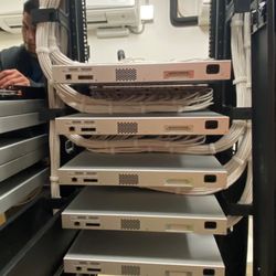 B Communications Inc - Final Product of Terminated Data Cable on Vertical Rack. Designed to customer specs & requirements