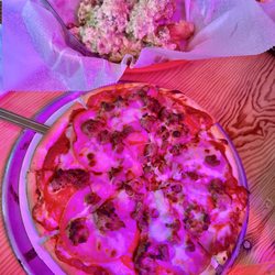 Pea Patch Motel & Saloon - Meat lovers pizza and garlic Parmesan wings