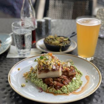 Grace & Grit - Mahi mahi southern garden style with Brussels pesto grits. - Southern Near Me - Mount Pleasant, South Carolina