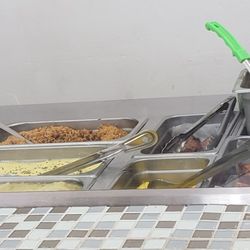 Salad Bar And Deli - Ask about the servings of beef, fish, pork, and chicken cooked local way.