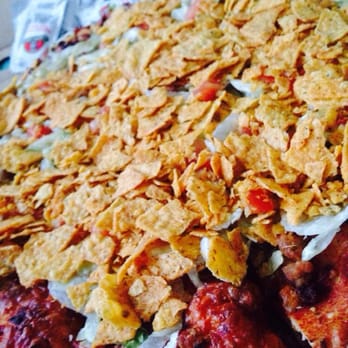Happy Joe's - a pizza with corn chips on top - Pizza Near Me - Moline, Illinois