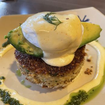 Snooze, an A.M. Eatery - Parmesan crusted crab cake Benedict- on their seasonal menu - Breakfast & Brunch Near Me - Addison, Texas