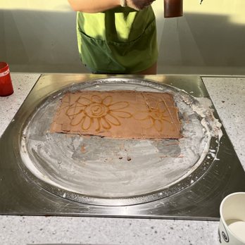 Rolling Monkey - Chocolate bases with caramel drizzle in the shape of a daisy - Ice Cream & Frozen Yogurt Near Me - Statesboro, Georgia
