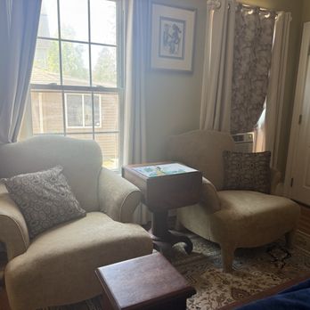 Naomi's Inn Bed and Breakfast - Twin overstuffed chairs to relax and watch television or read one of the many books found in the room. - Bed & Breakfast Near Me - Springfield, Massachusetts Naomi's Inn Bed and Breakfast - Twin overstuffed chairs to relax and watch television or read one of the many books found in the room. - Bed & Breakfast Near Me - Springfield, Massachusetts