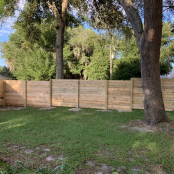 Diamond Fence Install and Repairs - Stair step horizontal fence..Customer preferred to step down and not slop it. - Fences & Gates Near Me Diamond Fence Install and Repairs - Stair step horizontal fence..Customer preferred to step down and not slop it. - Fences & Gates Near Me