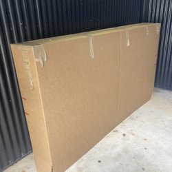 Thompson Moving & Storage - Left over sized box outside my building. Still waiting for them to dispose of it