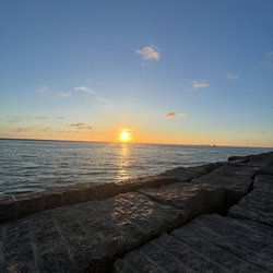 Jetty great place to watch the sun come up! And ships and dolphins!