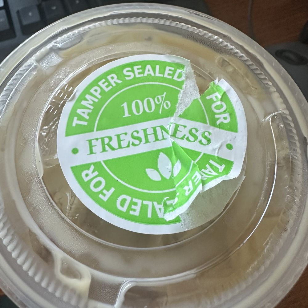 Coffe cup sticker falls apart. Coffe cup sticker falls apart.
