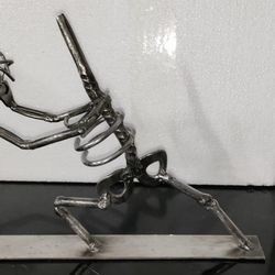 Raven Garcia-Metal Artist - Another view. These were made fr rebar and mild steel round bar. Client was to provide the skull.