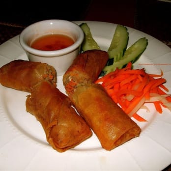 The Monkey Bridge - Cha Giò with pork, vermicelli noodle + shredded carrot served with Vietnamese lime dipping sauce. - Vietnamese Near Me - Seattle, Washington The Monkey Bridge - Cha Giò with pork, vermicelli noodle + shredded carrot served with Vietnamese lime dipping sauce. - Vietnamese Near Me - Seattle, Washington