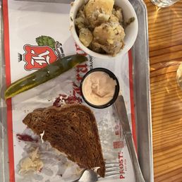 Rueben & German Potato Salad Pickle Spear & a side of Russian dressing. Rueben & German Potato Salad Pickle Spear & a side of Russian dressing.