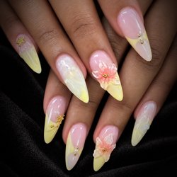 Pure Nails Spa - Soft yellow, delicate florals & a touch of gold Your next nail set is waiting at Pure Nails Spa. Book your appointment today.