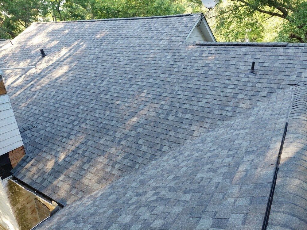 Slide of RainTight Roofing & Construction