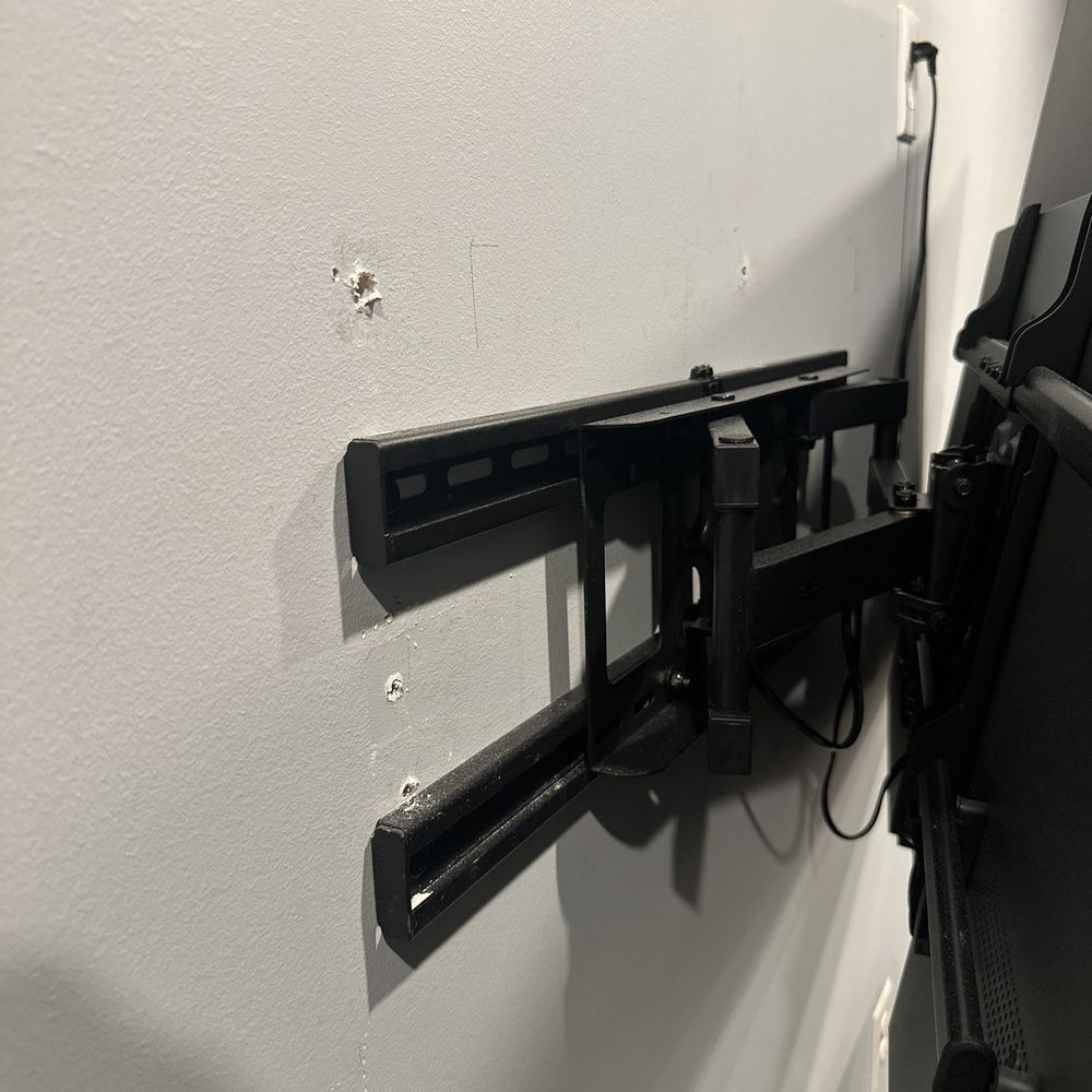 FixTman - Washington - Where technician had to take the bracket out of the wall and mount it lower - Furniture Assembly Near Me