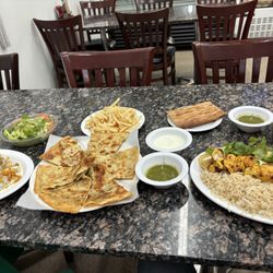 Kabul Corner - My kebab platter, bolani, and I forget the name of the dish on the left my girlfriend ordered