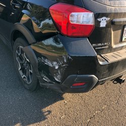 Refinishing Touch Auto Body - Left rear bumper damage before I dropped it off.