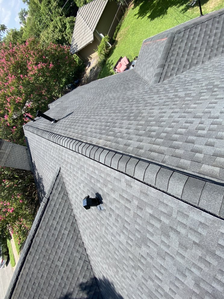 Slide of Holguin Roofing & Exteriors