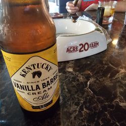 Smokers Choice - Kentucky Vanilla Barrel Cream Ale and a BIG ole cigar ash tray in the background.