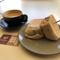 On Point The Piazza - Breakfast burrito & flat white